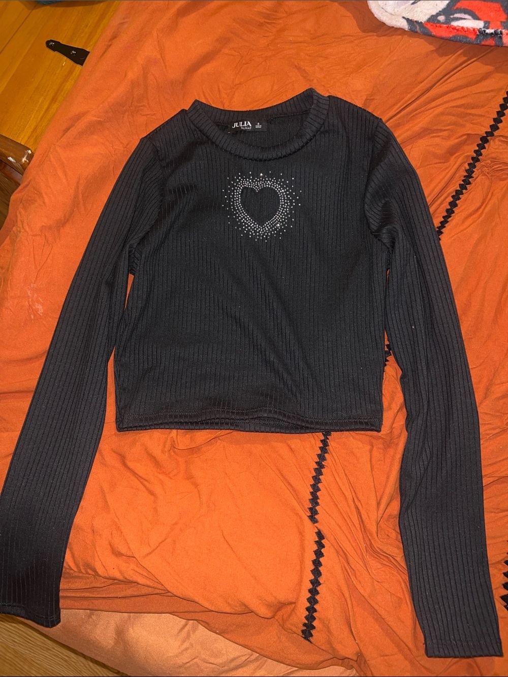 Black Ribbed Long-Sleeve Top with Heart Embellishment